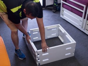 Slim Furniture donates 150 easy to assemble, transportable pieces of furniture to New Life Furniture Bank